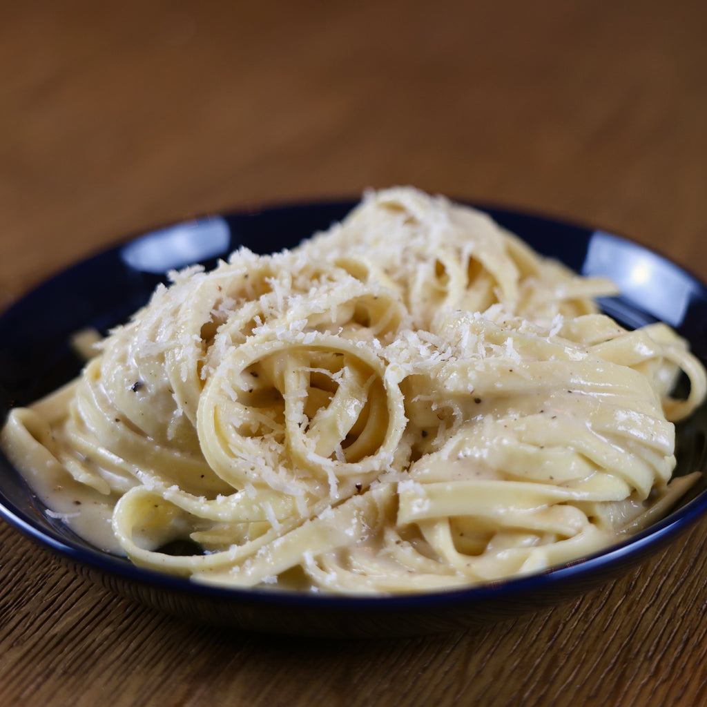 Fettuccine on a wooden table