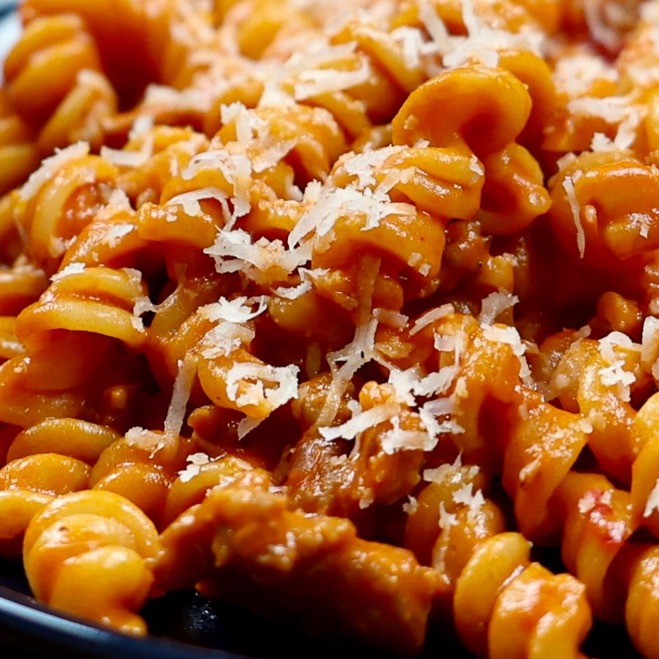 Close up of fusilli with red sauce